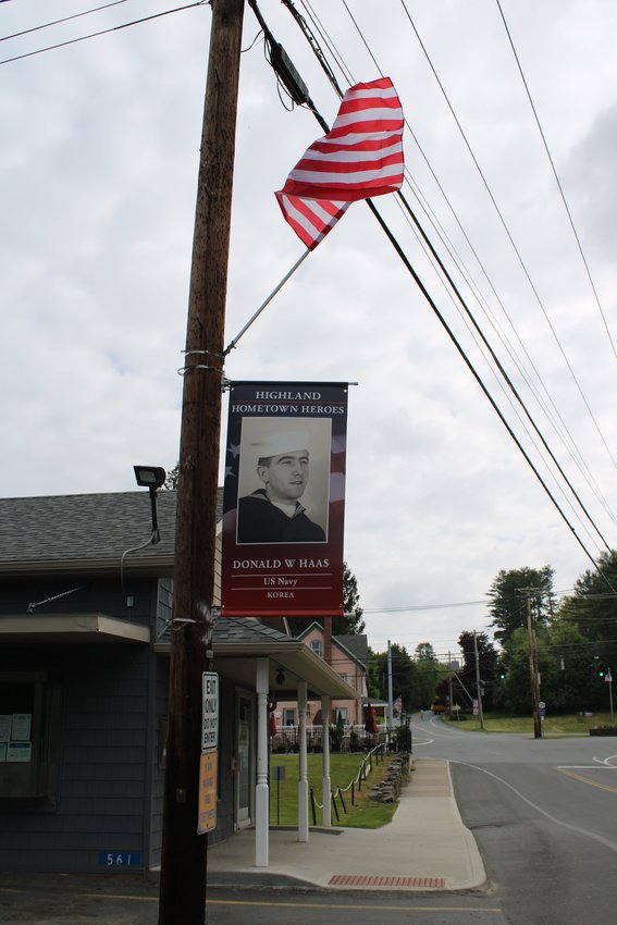 A banner honoring U.S Navy veteran Donald W. Haas
